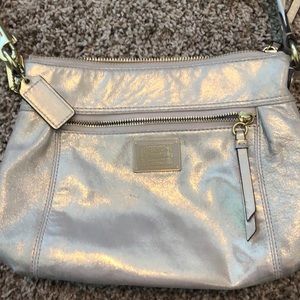 Coach Brand Poppy crossbody in gold.
